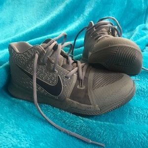 Kyrie 3 youth size 3 barely worn Basketball shoes.